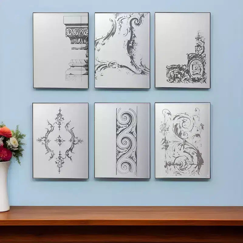 Lot de six miroirs décoratifs encadrés de métal noir vieilli