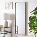 Miroir mural en fer doré 18 x 48